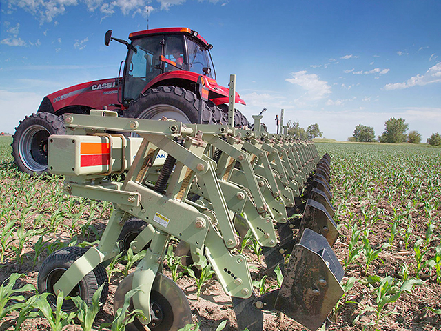 Orthman offers several size cultivators, including one as wide as 24 rows. It also sells a GPS-directed implement-guidance system to keep the tool in the rows. (Photo courtesy of Orthman Manufacturing)